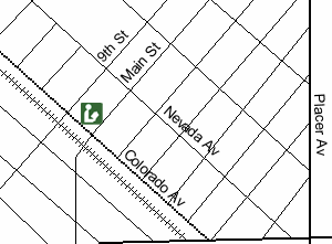 San Joaquin Library is on Main Street, between Colorado Avenue and 9th Street. It is across from a park.